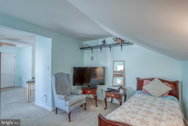 bedroom with light colored carpet, ceiling fan, and vaulted ceiling