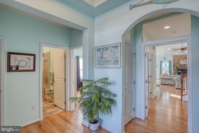 corridor featuring light hardwood / wood-style flooring