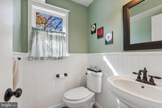 bathroom featuring sink and toilet