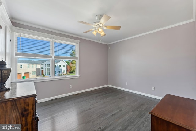 interior space featuring ornamental molding, dark hardwood / wood-style floors, and ceiling fan