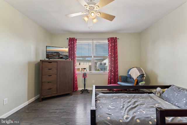 bedroom with dark hardwood / wood-style floors and ceiling fan