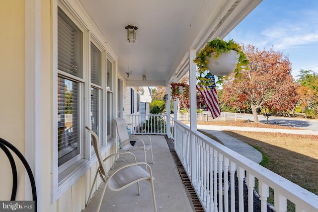 balcony featuring a porch