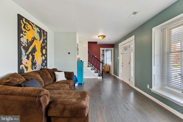 living room with dark wood-type flooring