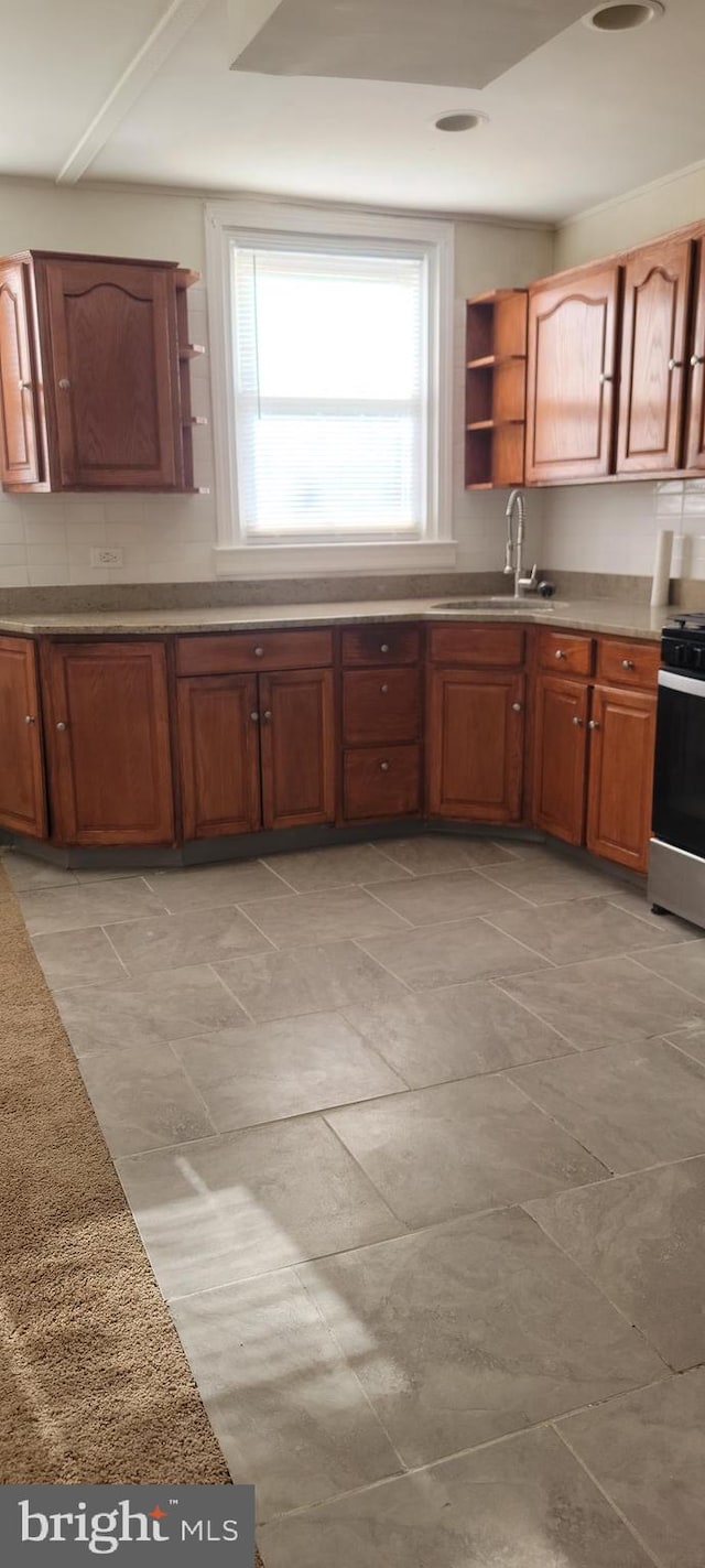 kitchen with sink and stainless steel stove