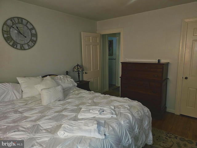 bedroom featuring hardwood / wood-style floors