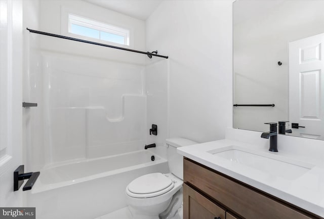 full bathroom featuring  shower combination, vanity, and toilet