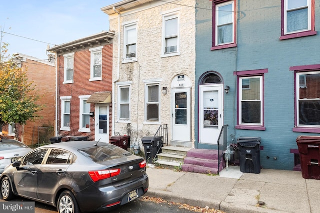 828 W 7th St, Wilmington, DE 19801 - townhome / multi-family property with entry steps and brick siding