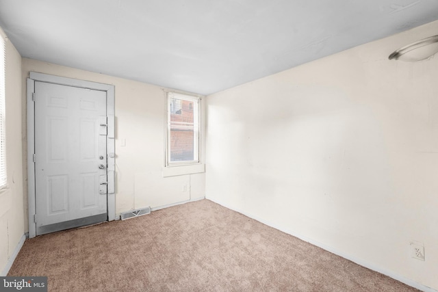 empty room with carpet flooring