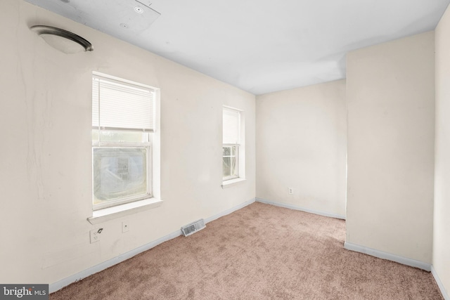 828 W 7th St, Wilmington, DE 19801 - carpeted empty room featuring visible vents and baseboards