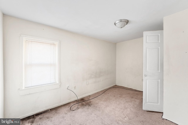 view of carpeted spare room