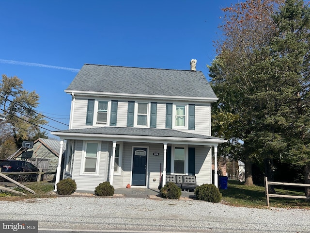 front of property featuring a porch