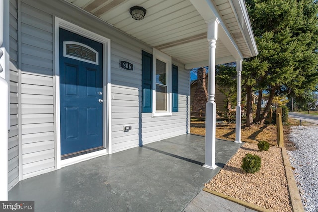 property entrance with a porch