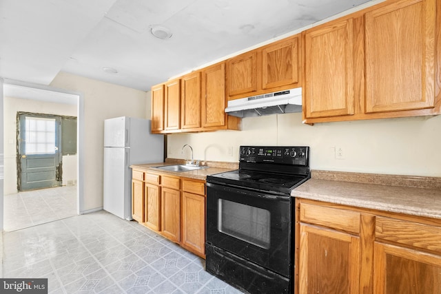 kitchen featuring sink, electric range, white fridge, and light tile patterned floors