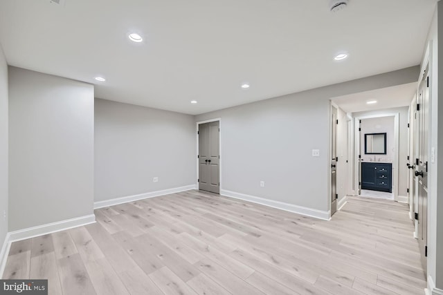 empty room with light wood-type flooring