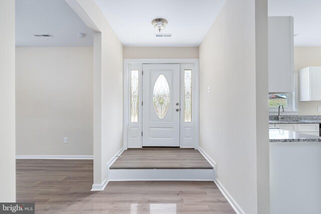 35 Grinnan Ln, Fredericksburg, VA 22406 - foyer featuring light wood-type flooring and baseboards