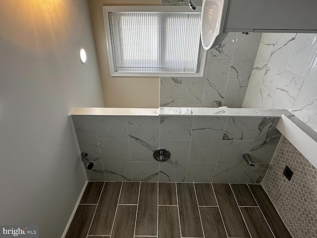 bathroom featuring walk in shower