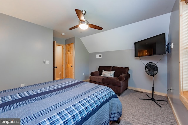 bedroom with carpet floors, vaulted ceiling, and ceiling fan