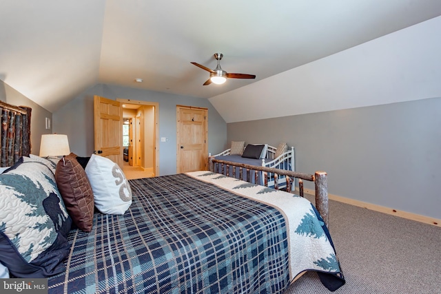 bedroom featuring carpet floors, vaulted ceiling, and ceiling fan