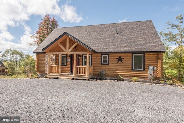 cabin with covered porch