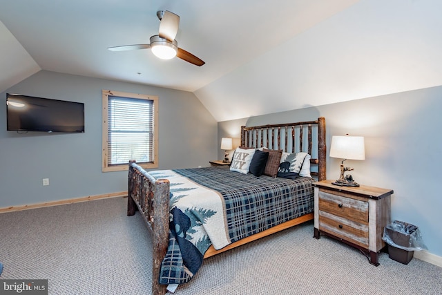 carpeted bedroom featuring vaulted ceiling and ceiling fan