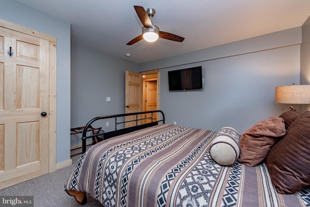 bedroom featuring ceiling fan and carpet flooring