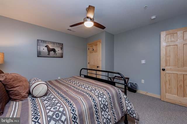 carpeted bedroom featuring ceiling fan