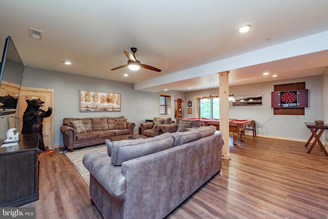 living room with hardwood / wood-style floors, pool table, and ceiling fan