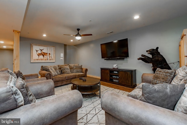 living room featuring ceiling fan