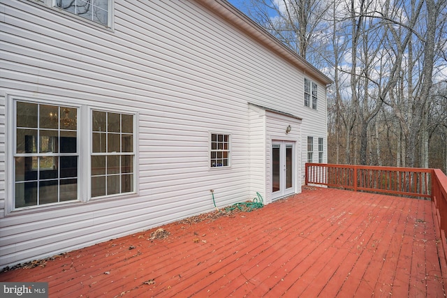 wooden deck featuring french doors