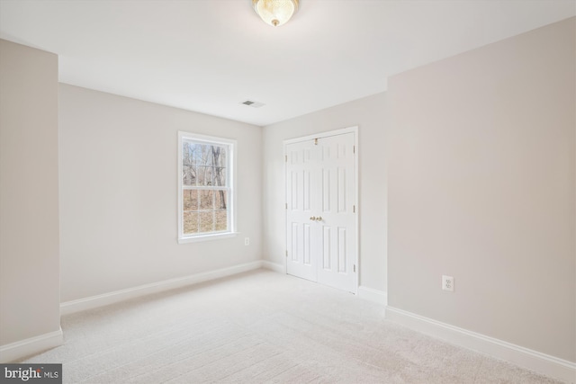 view of carpeted spare room