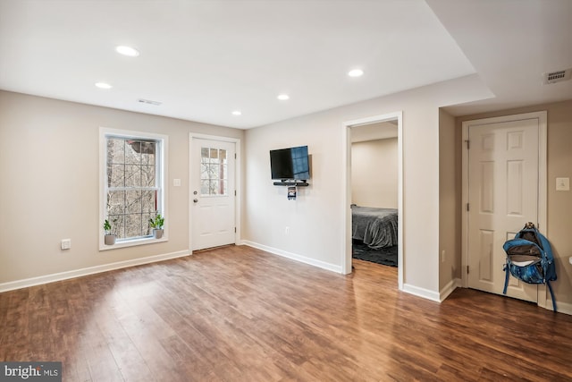 entrance foyer featuring dark wood-type flooring