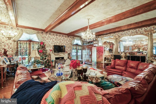 living room with beamed ceiling, hardwood / wood-style floors, crown molding, and a textured ceiling