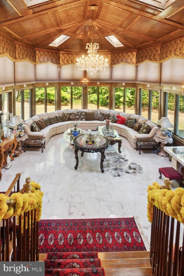 sunroom with a notable chandelier, a healthy amount of sunlight, and wooden ceiling