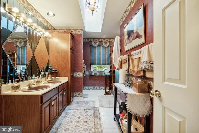 bathroom with vanity and tile patterned flooring