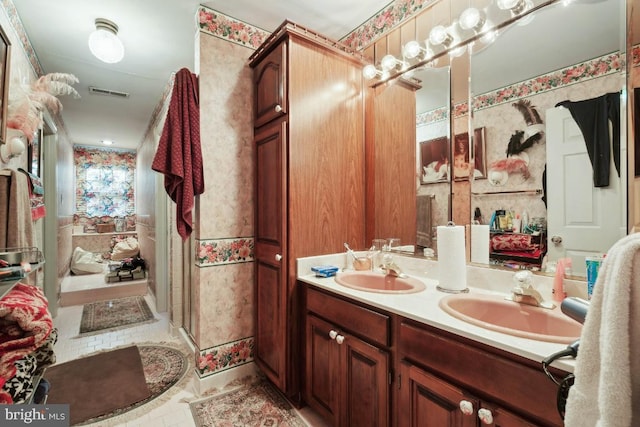 bathroom featuring vanity and tile patterned flooring