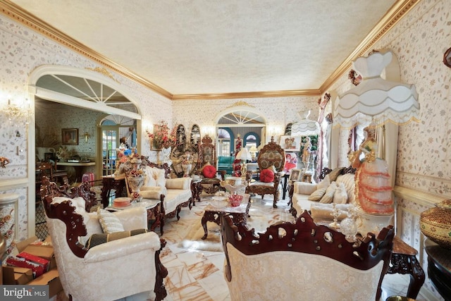 living room with ornamental molding and a textured ceiling