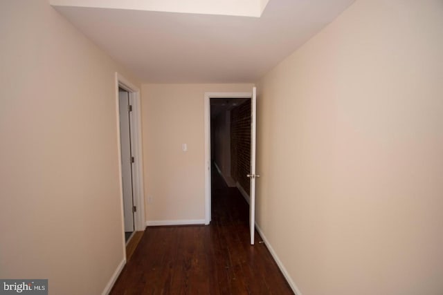 hall featuring dark hardwood / wood-style floors