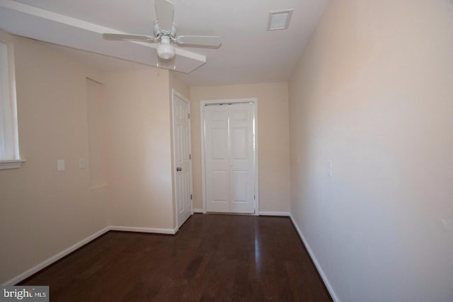 interior space with dark hardwood / wood-style flooring