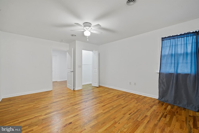 unfurnished bedroom featuring ceiling fan and light hardwood / wood-style floors