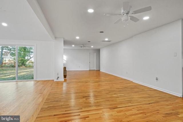 unfurnished room featuring ceiling fan and light hardwood / wood-style flooring