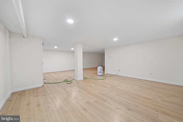 basement with light wood-type flooring