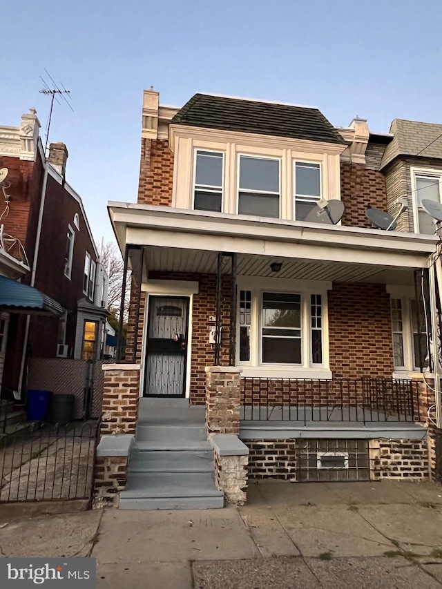 view of property with a porch