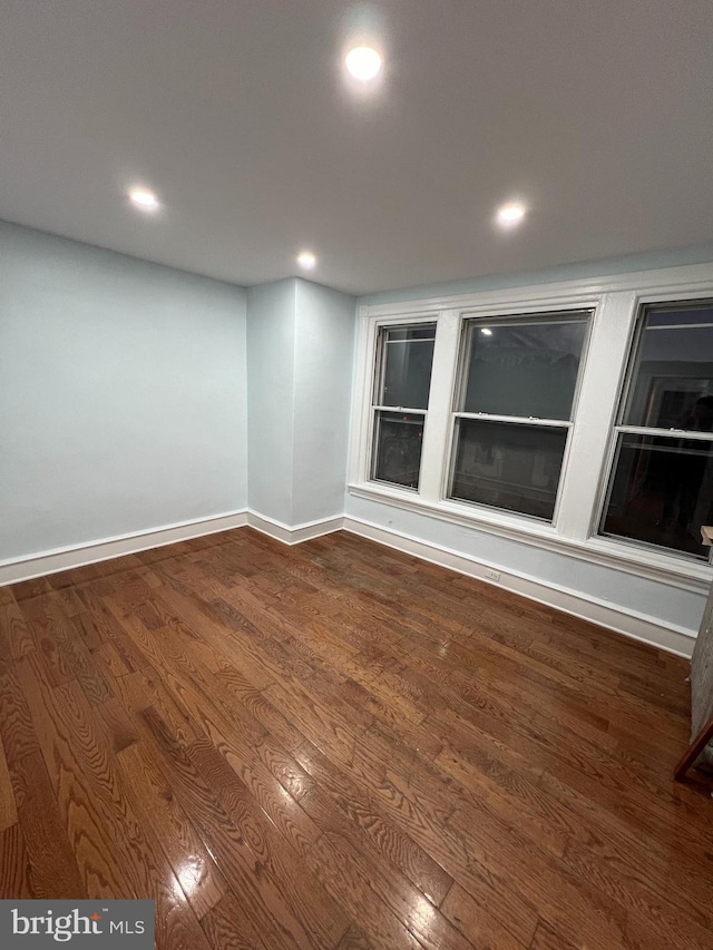 empty room featuring hardwood / wood-style floors