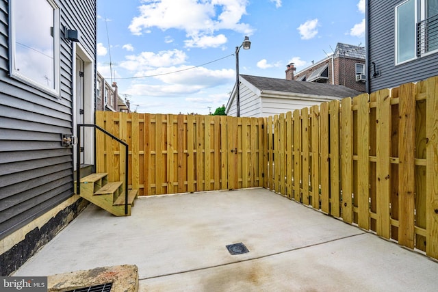 view of patio with fence