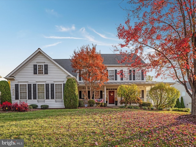 view of front of home featuring a front yard