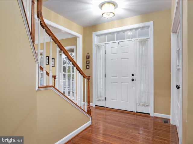 entryway with wood-type flooring