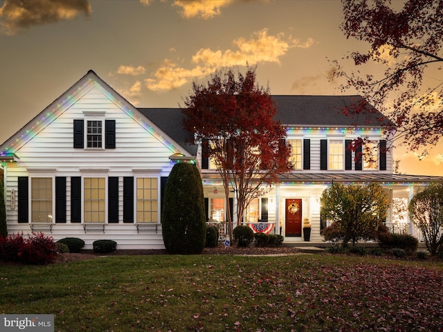 view of front of home featuring a yard