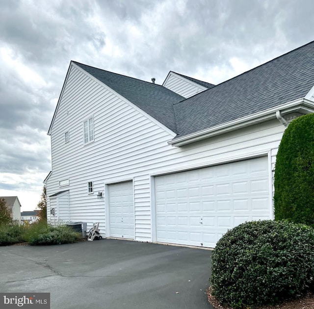 exterior space with a garage