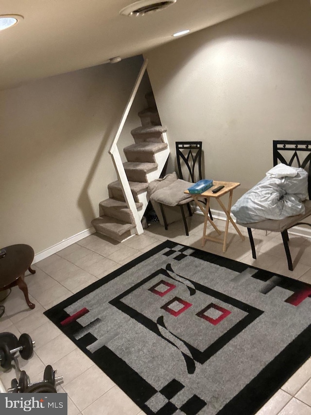 sitting room featuring tile patterned flooring