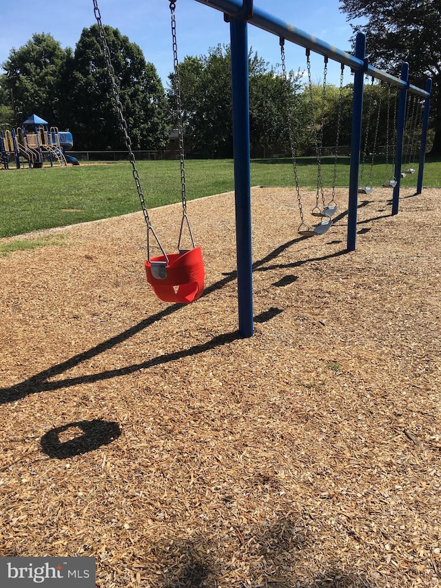 view of play area featuring a yard